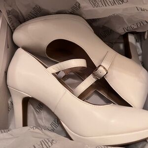 White Mary Jane high heals.